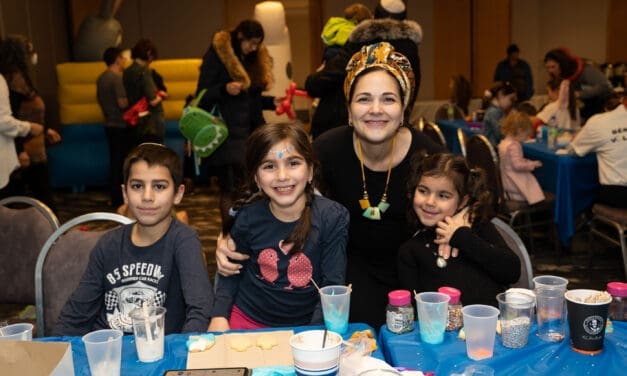 Agence Ometz’s Family Hanukkah Party brings together newcomers from around the world